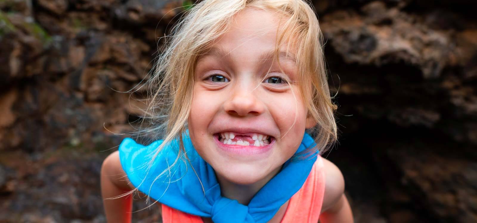 little girl smiles big for the signs you need braces
